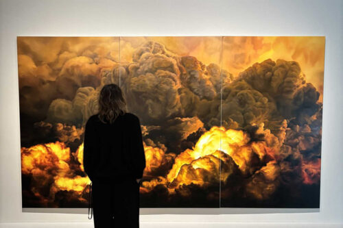 Photo from the Exhibition, featuring the signature painting by Anne Imhof, Untitled, Oil on printed canvas - 2022, Paris, Pinault Collection - Photography © Timo Ohler. Courtesy of the artist, Spruethmagers and Galerie Buchholz