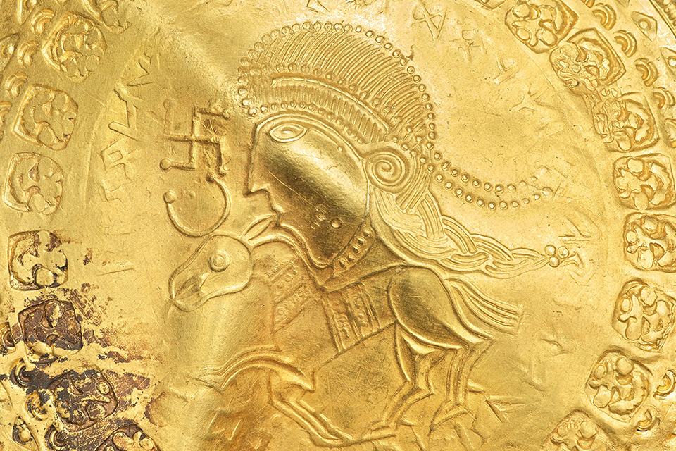 Detail. C-Bracteate IK 738 with Odin-inscription hovering over a horse. National Museum of Copenhagen CCBYSA