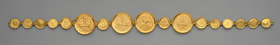 Golden girdle c. 586. © Metropolitan Museum Object Number: 17.190.147; 1991.136. Open Domain