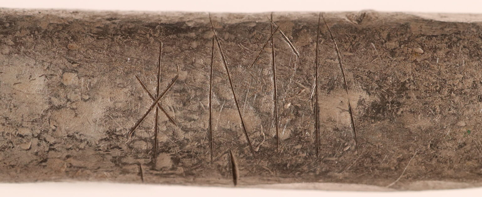 Silver ingot from Rebild with Runic inscription Hutu ©NJM