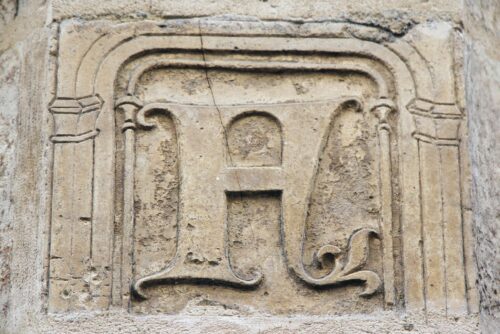 Monogramme af Nicolas Flamel. from the façade of the house at Rue de Montmoricy. Sorce: wikipedia
