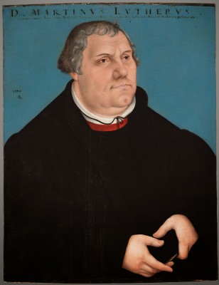 Martin Luther with a red cravat by school of Cranach