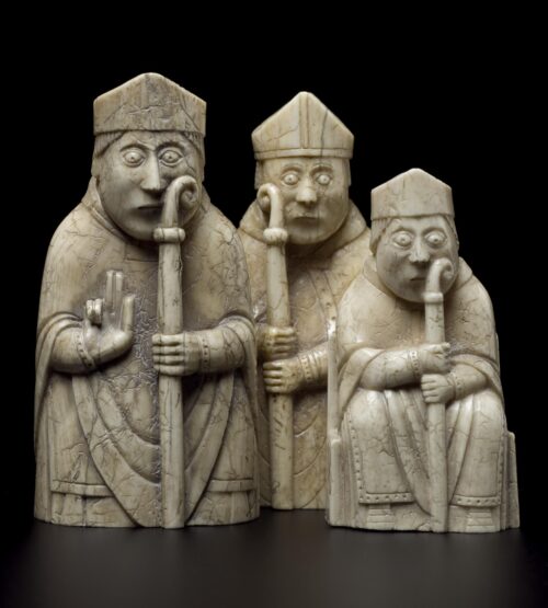 Bishops from The Lewis Chessmen. Source: Wikipedia/National Museum of Scotland. CCBYSA