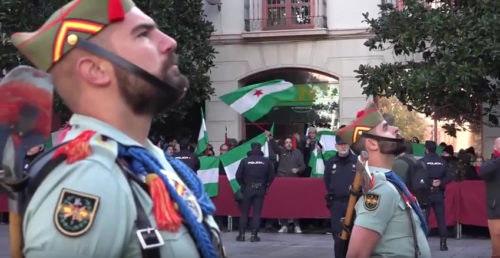 Spanish legion in front of a crowd waving Andalucian flags. Source: Twitter