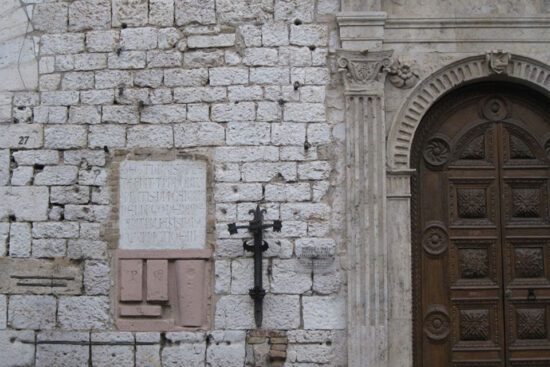 Medieval standards posted on the wall of the City Hall in Assisi. Source: tripadvisor