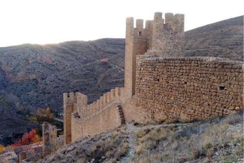 Medieval wall in Albarracin with landscape behind
