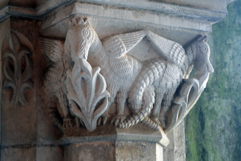 Alçobaca in Portugal. Cistercian architecture with column featuring Phoenix. © Schousboe