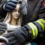 Firefighters saving a Statue of the Virgin Mother out of the Cathedral of Notre-DameSource: Facebook