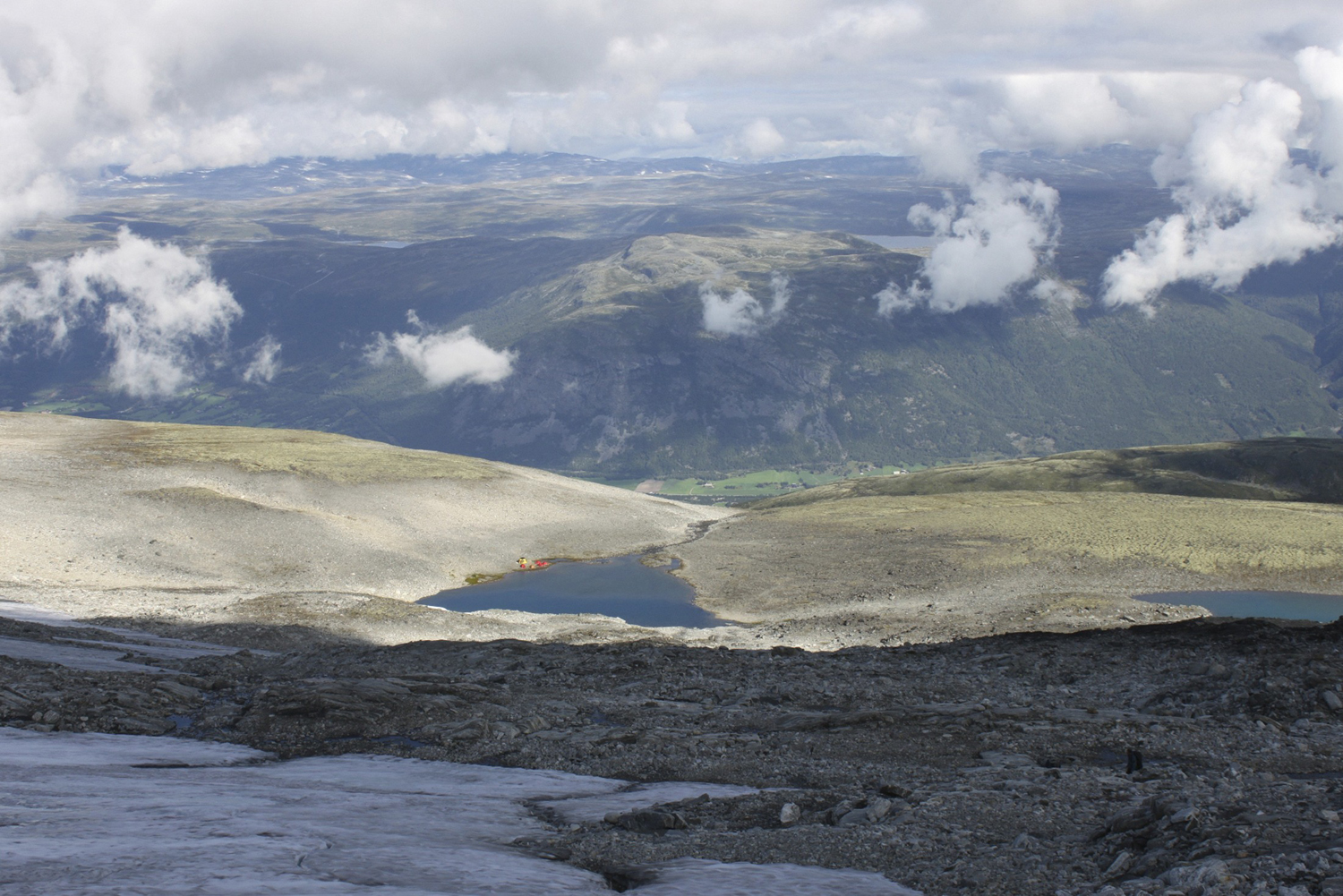 General view over valley in mountains of south Norway from beside Lendbreen glacier